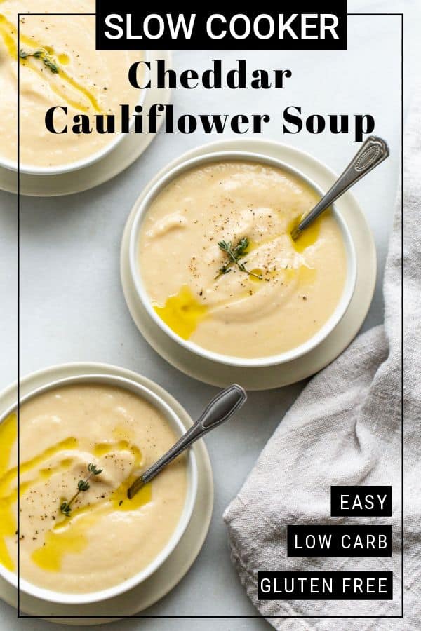 Want a cozy, comforting, and delicious soup to warm you up this winter? You'll love this creamy low carb Slow Cooker Cheddar Cauliflower Soup! thetoastedpinenut.com #thetoastedpinenut #cauliflower #soup #cauliflowersoup #slowcooker #slowcookerrecipes #crockpot #crockpotrecipes