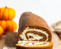 side view of the swirl pumpkin roll with one slice cut off