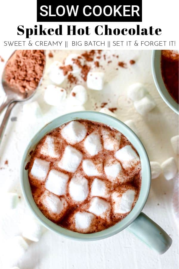This winter, warm up with this Slow Cooker Spiked Hot Chocolate! It's the perfect chocolatey, rich, decadent drink to get the holiday party started! thetoastedpinenut.com #thetoastedpinenut #hotchocolate #spikedhotchocolate #crockpot #slowcooker