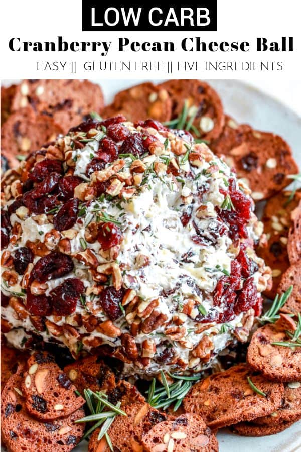Whip up this Cranberry Pecan Christmas Cheese Ball for your next holiday party or potluck! It's loaded with flavors and takes only five ingredients to make! thetoastedpinenut.com #thetoastedpinenut #cheeseball #appetizer #holidayappetizer #christmasappetizer #cheeseplate