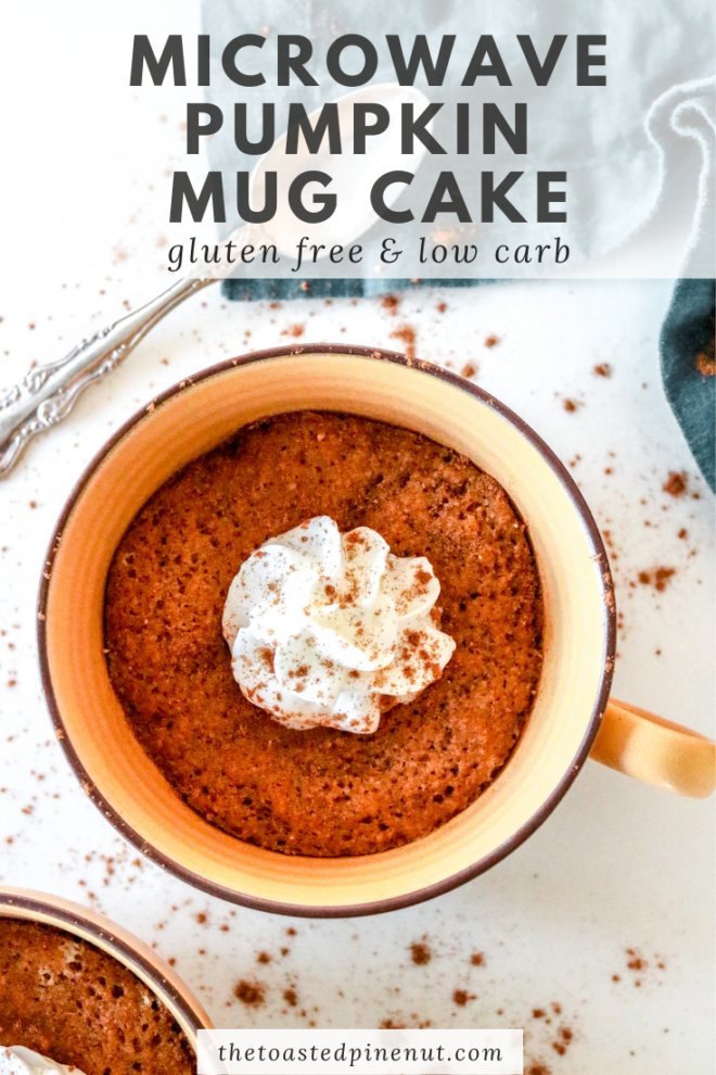 overhead image of a pumpkin cake made in a microwave with a dollop of whipped cream and sprinkle of pumpkin spice with text overlay "microwave pumpkin mug cake gluten free & low carb"