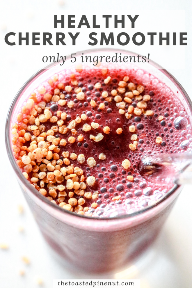 This is an overhead image looking into a glass with a cherry smoothie in it and puffed quinoa. The glass sits on a white counter. Text overlay reads "healthy cherry smoothie only 5 ingredients!"