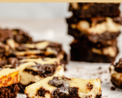 This is a side image of a brownie with a cheesecake top layer and a bite taken out. The brownie sits on a white piece of parchment paper and more brownies are blurred in the background. Text overlay reads "Fudgey Cheese flourless & gluten free"