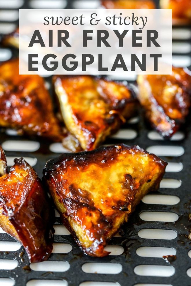 This is a side view of an air fryer tray with caramelized and glazed eggplant pieces. Text overlay reads "sweet & sticky air fryer eggplant."