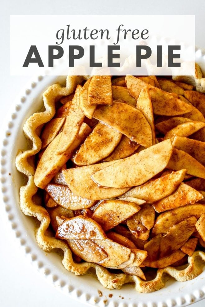 This is an overhead image of an apple pie in a white pie dish with a cooked pie crust and raw apples coated with cinnamon in it. Text overlay reads "gluten free apple pie."