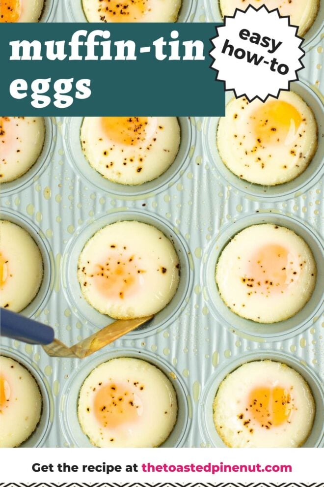 This is an overhead vertical image of a light blue muffin tin sprayed with cooking oil. Each muffin cavity has a baked egg in it and sprinkled with visible specs of pepper. A small spatula is sliding under one of the middle eggs to remove it from the tin. Text overlay reads "muffin - tin eggs easy how-to."