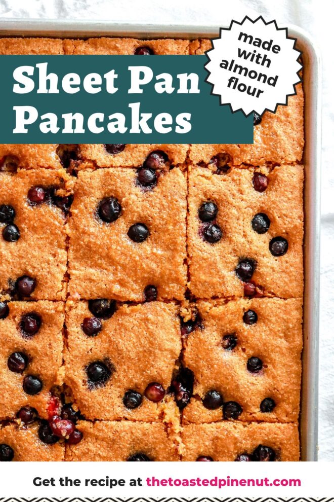 This is an overhead vertical image of a sheet pan with blueberry cake baked. The cake is cut into squares. The sheet pan sits on a light surface. Text overlay reads "sheet pan pancakes made with almond flour."