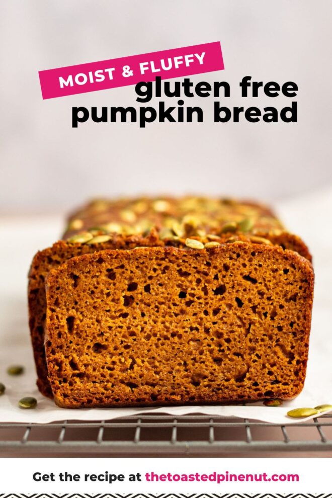 This is a horizontal image looking at pumpkin bread loaf sitting on a piece of white parchment paper on a cooling rack. The pumpkin bread has green pumpkin seeds on top and a few have fallen off and are scattered around the base of the bread. The bread is cut into revealing the fluffy texture. The cooling rack sits on a light colored surface with a white background. Text overlay reads "moist & fluffy gluten free pumpkin bread."