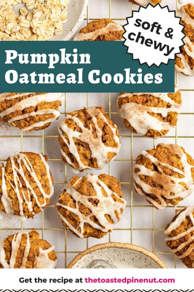 This is an overhead vertical image of pumpkin oat cookies drizzled with a white icing and sprinkled with pumpkin spice. The cookies sit on a gold cooling rack. A small white speckled bowl with oats is to the top left corner of the image and a small white speckled bowl with a brown rim is in the bottom center of the image with white icing and small whisk in it. The cooling rack sits on a white surface. Text overlay reads "soft & chewy pumpkin oatmeal cookies."